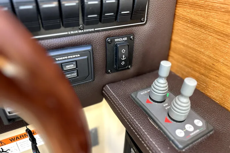 Slide: The Image of Control panel of a 2013 Ranger Tugs R-27 boat with Volvo Penta ignition. - 24