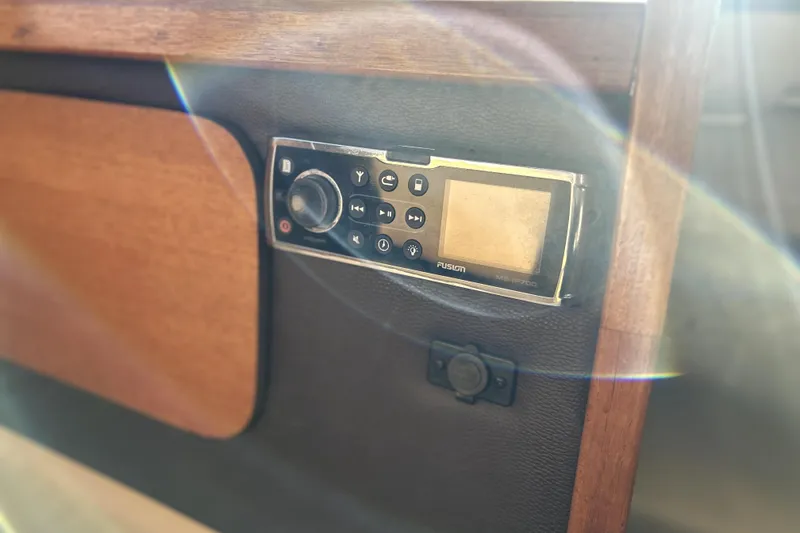 Slide: The Image of Fusion stereo system on 2013 Ranger Tugs R-27 boat interior. - 36