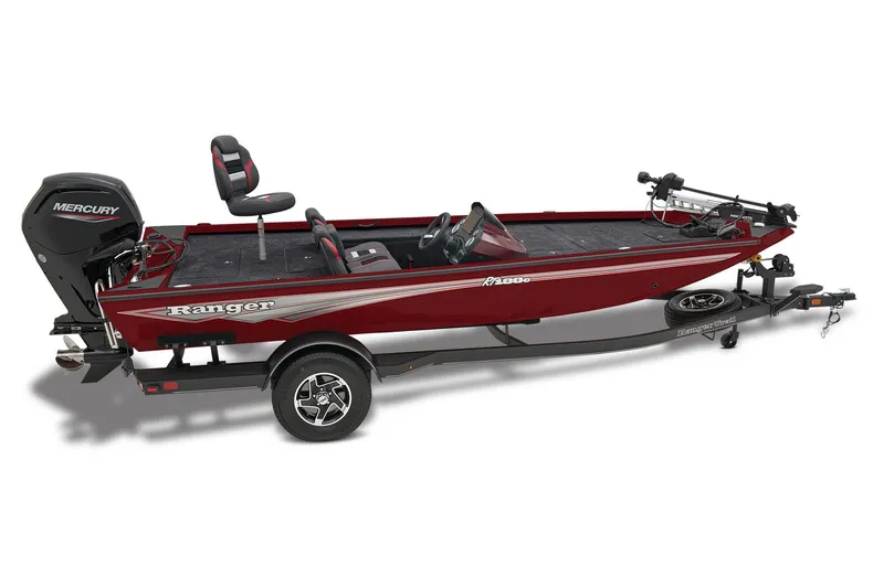 Slide: The Image of 2026 Ranger RT188C boat interior with blue and gray seating on a concrete surface. - 8