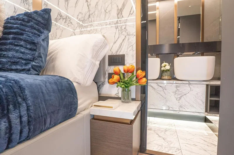 Slide: The Image of Luxurious 2024 Explorer EX62 interior with marble accents and elegant floral decor. - 32