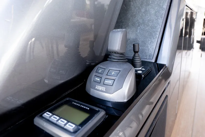 Slide: The Image of 2024 Explorer EX62 control panel with joystick and digital display. - 41