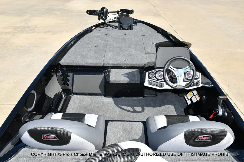 Slide: The Image of 2026 Ranger Z185 boat interior with modern dashboard and seating. - 4
