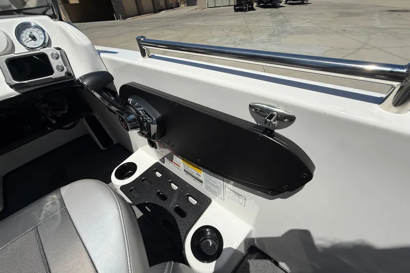 Slide: The Image of Interior of 2026 Nitro ZV19 Sport Pro boat, featuring control panel and seating. - 21