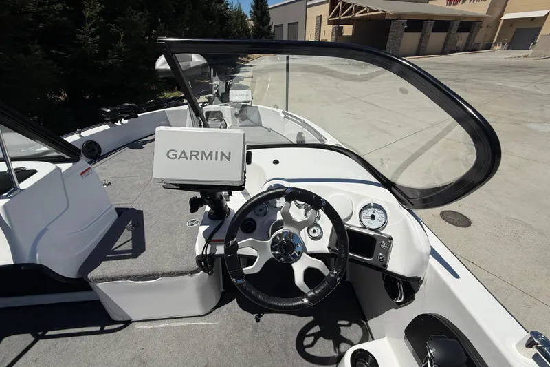 Slide: The Image of Cockpit view of 2026 Nitro ZV19 Sport Pro boat with Garmin navigation system. - 11