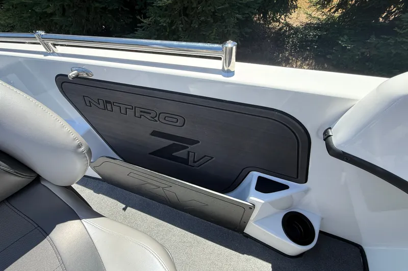 Slide: The Image of Interior of 2026 Nitro ZV19 Sport Pro boat with seating and storage compartment. - 22