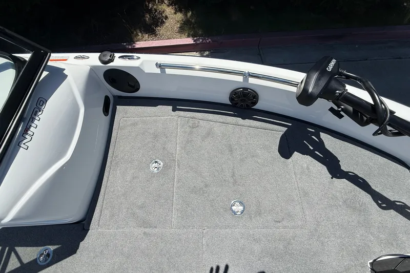 Slide: The Image of 2026 Nitro ZV19 Sport Pro boat deck with Garmin trolling motor and speaker system. - 30