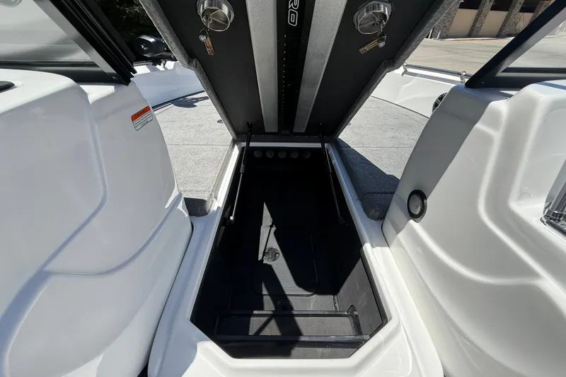 Slide: The Image of Open storage compartment in 2026 Nitro ZV19 Sport Pro boat. - 16