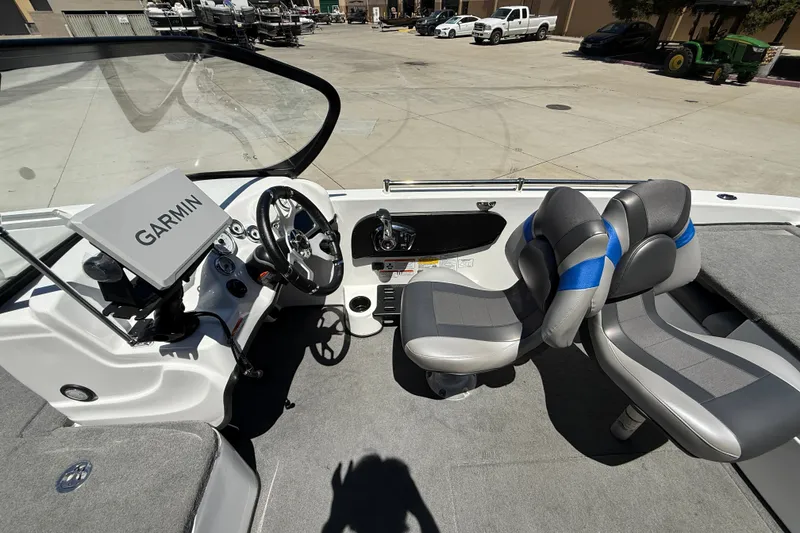 Slide: The Image of Interior of 2026 Nitro ZV19 Sport Pro boat with Garmin navigation system and dual seating. - 10