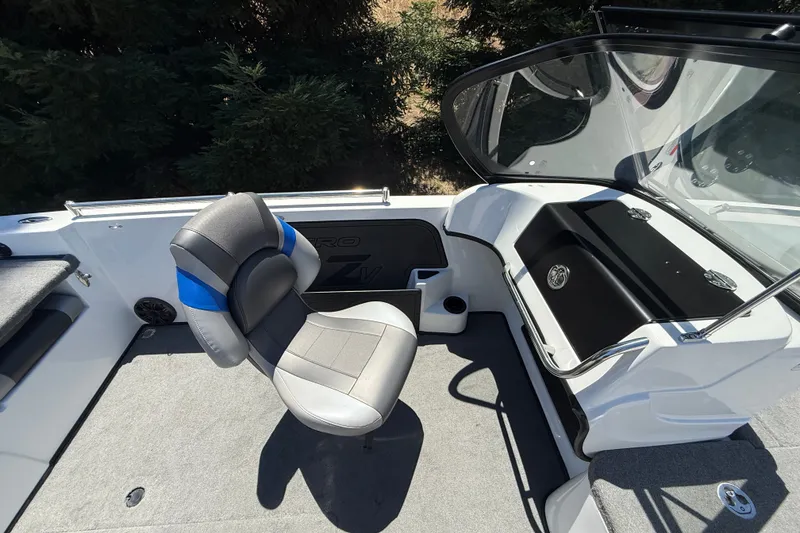 Slide: The Image of 2026 Nitro ZV19 Sport Pro boat interior with seating and dashboard. - 17