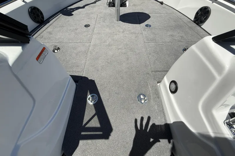 Slide: The Image of Interior view of 2026 Nitro ZV19 Sport Pro boat, featuring spacious carpeted deck. - 15