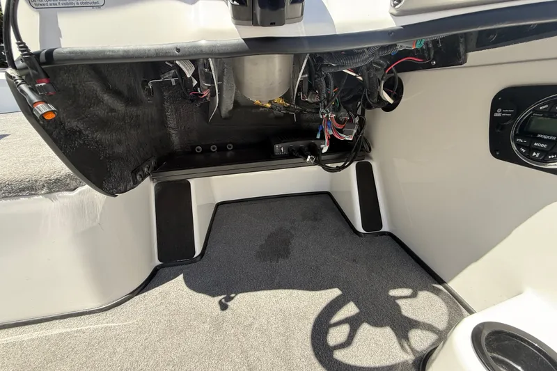 Slide: The Image of Interior view of a 2026 Nitro ZV19 Sport Pro boat, showcasing wiring and dashboard components. - 27
