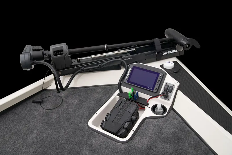 Slide: The Image of 2026 Ranger RT198P boat dashboard with steering wheel and Lowrance display. - 9