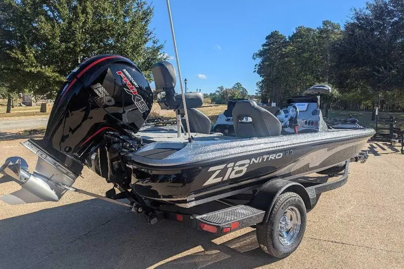 Slide: The Image of 2026 Nitro Z18 boat with powerful engine, parked outdoors on a sunny day. - 3