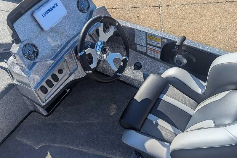 Slide: The Image of 2026 Nitro Z18 boat cockpit with steering wheel and comfortable seating. - 5