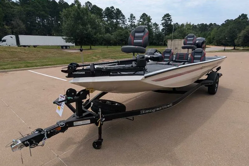 Slide: The Image of 2026 Ranger RT198P fishing boat on trailer in parking lot. - 19