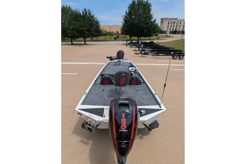 Slide: The Image of 2026 Ranger RT198P boat with Mercury 150 engine in parking lot. - 5