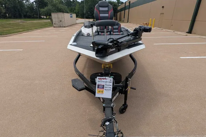 Slide: The Image of 2026 Ranger RT198P boat on trailer in parking lot. - 17