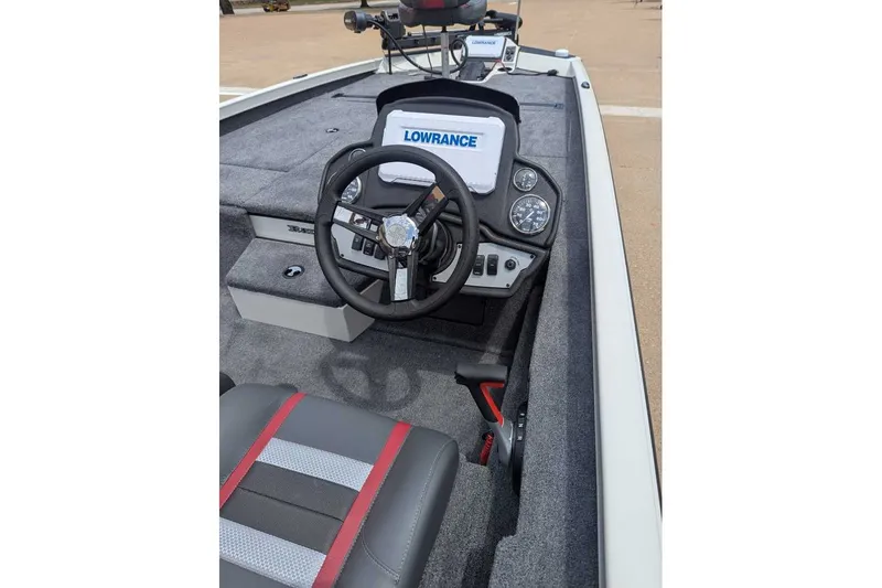 Slide: The Image of 2026 Ranger RT198P boat interior with steering wheel and Lowrance electronics. - 21