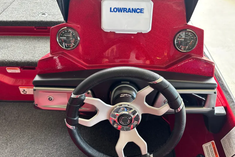 Slide: The Image of Steering wheel and dashboard of 2026 Nitro Z20 XL boat with Lowrance display. - 13