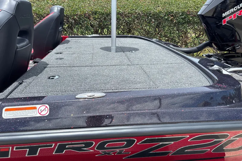 Slide: The Image of 2026 Nitro Z20 XL boat deck with Mercury engine, featuring spacious seating and storage. - 11