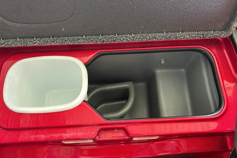 Slide: The Image of Red Nitro Z20 XL 2026 storage compartment with cup holder and organizer. - 21