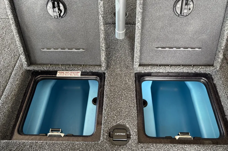 Slide: The Image of 2026 Nitro Z20 XL boat storage compartments with open lids and blue interiors. - 33
