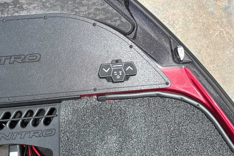 Slide: The Image of 2026 Nitro Z20 XL boat deck with control panel and textured surface. - 29