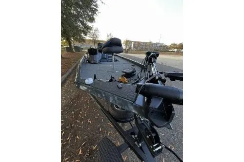 Slide: The Image of 2026 Ranger RT178C fishing boat on trailer, parked outdoors. - 6