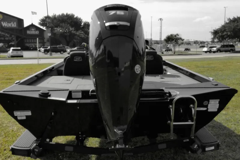 Slide: The Image of Ranger RT178 from 2026 with a 75 HP motor, parked on grass, with buildings in the background. - 3