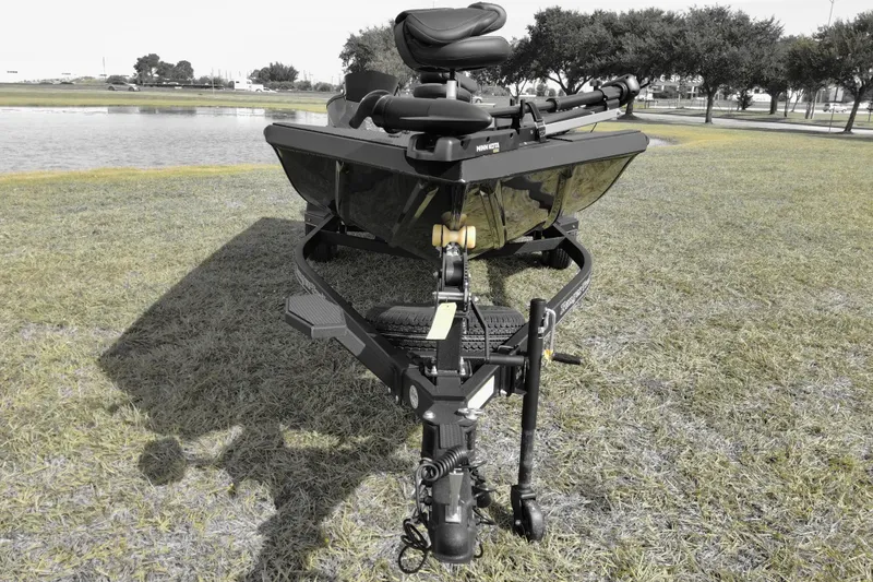 Slide: The Image of 2026 Ranger RT178 boat on trailer, parked on grass near a lake. - 6
