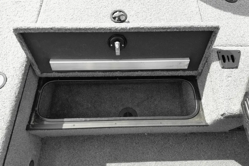 Slide: The Image of 2026 Ranger RT178 boat storage compartment with open lid, showcasing interior space. - 9