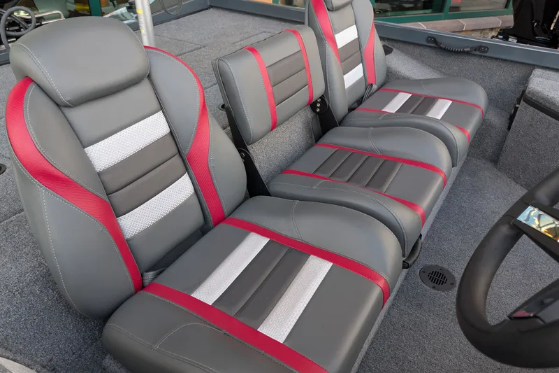 Slide: The Image of 2026 Ranger RT178 boat interior with gray and red cushioned seats. - 8