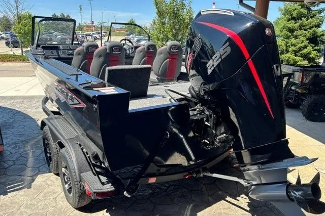 Slide: The Image of 2026 Ranger VX1888 WT boat with powerful 225 HP engine, sleek black design. - 8