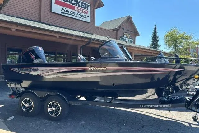 The Image of 2026 Ranger VX1888 WT boat on trailer outside Tracker Boats store. - 0