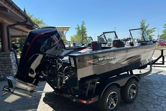 Slide: The Image of 2026 Ranger VX1888 WT boat on trailer, featuring sleek design and powerful outboard motor. - 1
