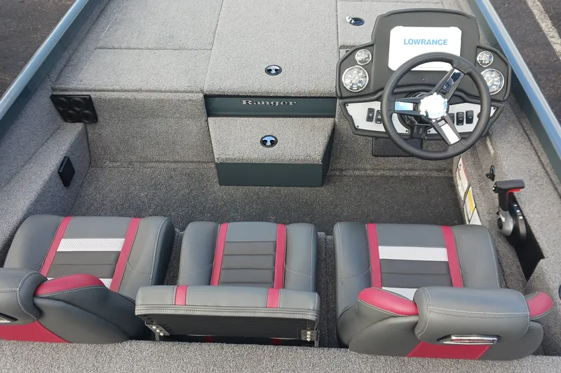 Slide: The Image of 2026 Ranger RT198P boat interior with steering wheel and three seats, featuring Lowrance electronics. - 4