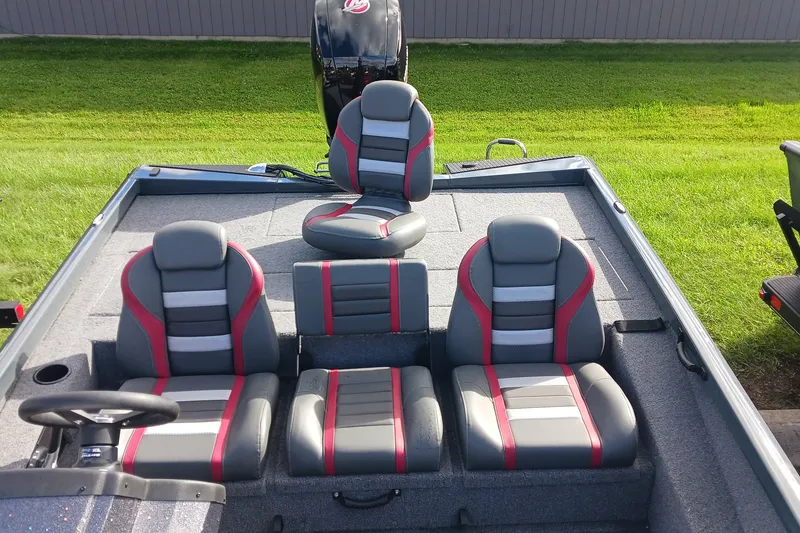 Slide: The Image of 2026 Ranger RT198P boat interior with stylish gray and red seating arrangement. - 9