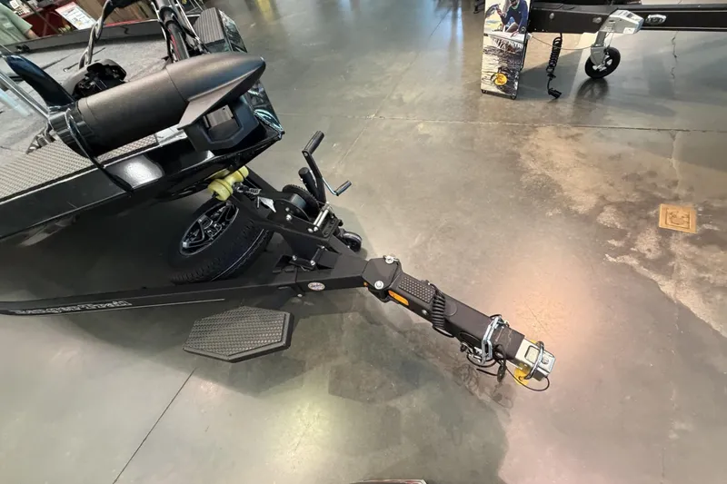 Slide: The Image of 2026 Ranger RT188C boat trailer hitch and winch on showroom floor. - 3