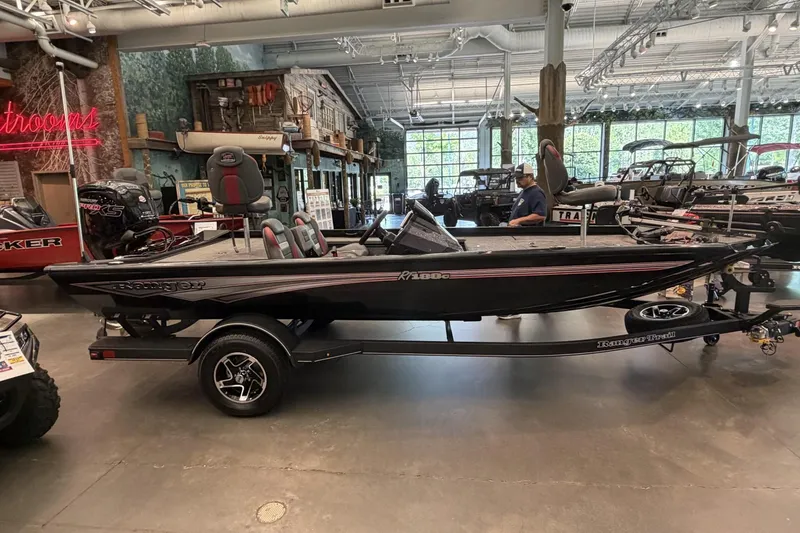 The Image of 2026 Ranger RT188C boat displayed indoors on a trailer in a showroom. - 0