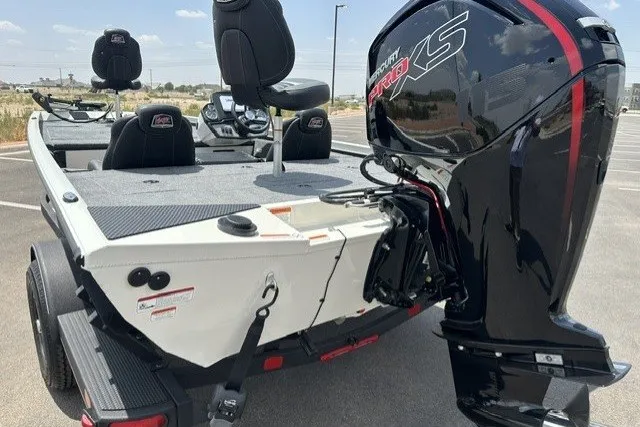 Slide: The Image of 2026 Ranger RT188 boat with powerful outboard motor, featuring spacious seating and modern design. - 5