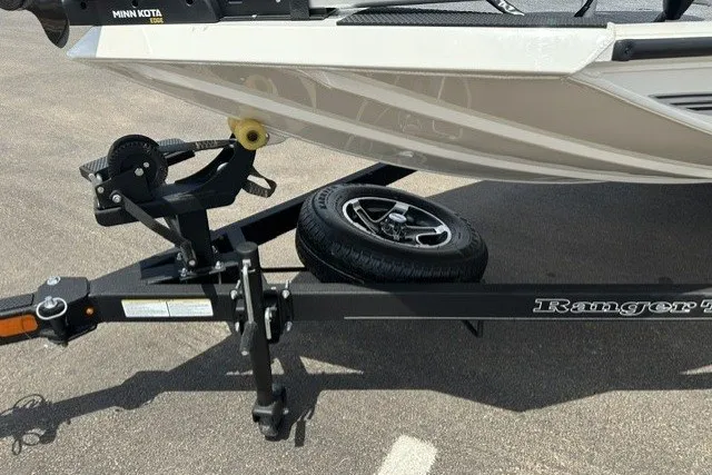 Slide: The Image of 2026 Ranger RT188 boat trailer with spare tire and Minn Kota motor. - 9