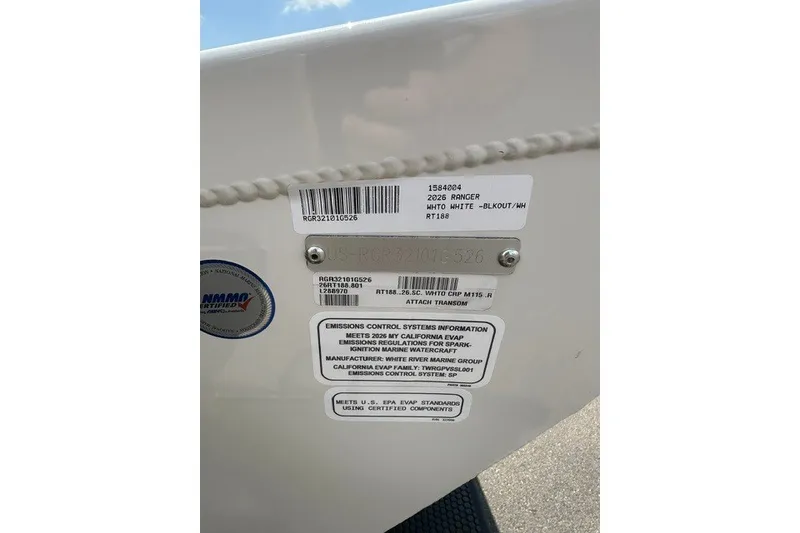 Slide: The Image of 2026 Ranger RT188 boat identification and emissions labels on white surface. - 113