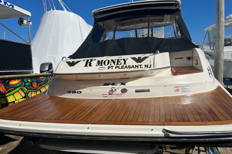 Slide: The Image of 2015 Sea Ray 350 SLX boat with wooden deck, docked in Pt Pleasant, NJ. - 2