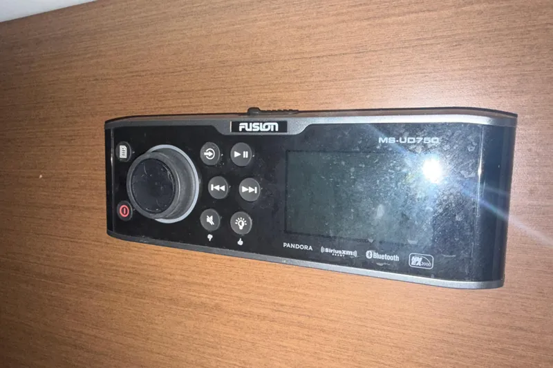 Slide: The Image of Fusion MS-UD750 marine stereo on 2015 Sea Ray 350 SLX boat dashboard. - 20
