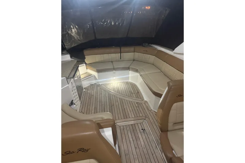 Slide: The Image of Luxurious interior of 2015 Sea Ray 350 SLX boat with elegant seating and wood flooring. - 5