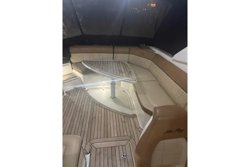 Slide: The Image of Luxurious interior of 2015 Sea Ray 350 SLX with elegant seating and wooden flooring. - 6