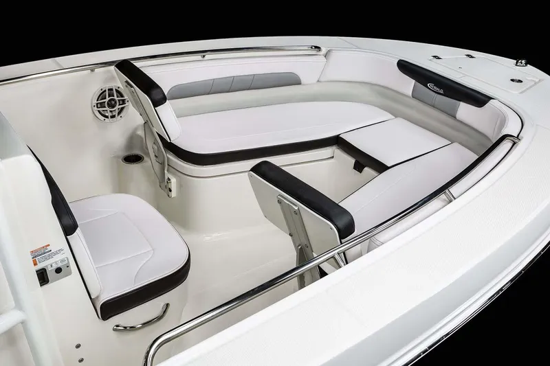Slide: The Image of Manufacturer Provided Image: 2025 Robalo R202 Explorer boat interior with cushioned seating and sleek design. - 9