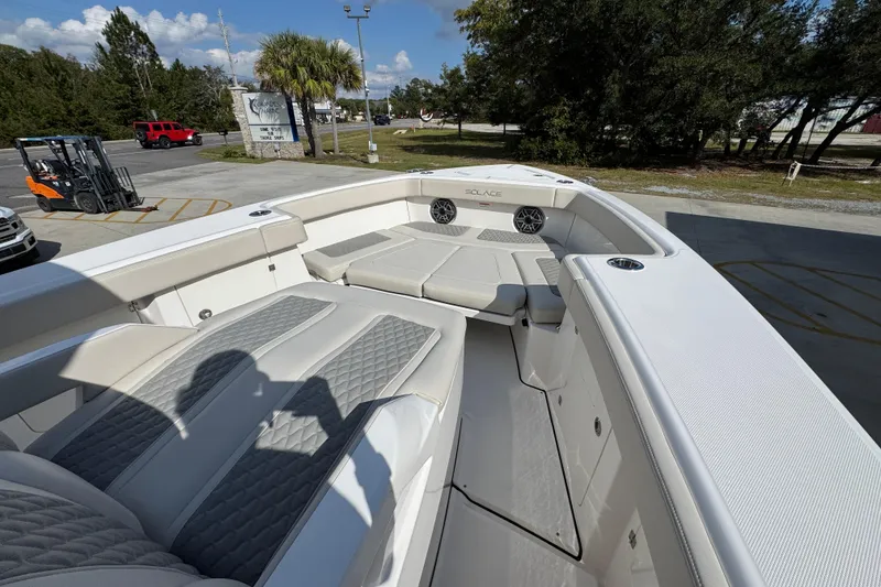 Slide: The Image of 2026 Solace 32 CS boat interior with luxurious seating and modern design. - 17