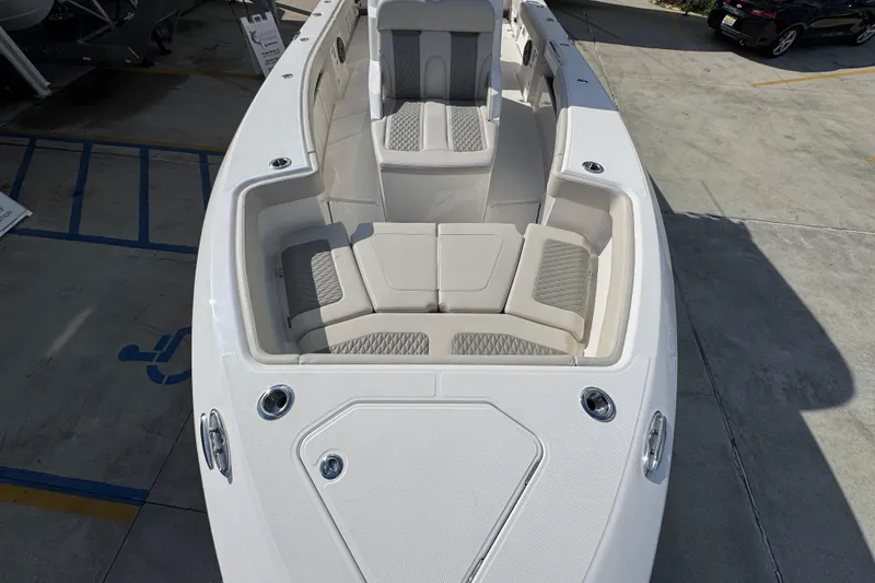 Slide: The Image of 2026 Solace 32 CS boat interior with luxurious seating and sleek design. - 20