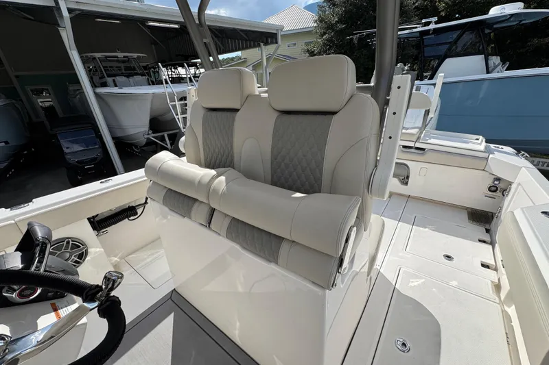 Slide: The Image of Luxury seating on 2026 Solace 32 CS boat, featuring elegant design and premium materials. - 34